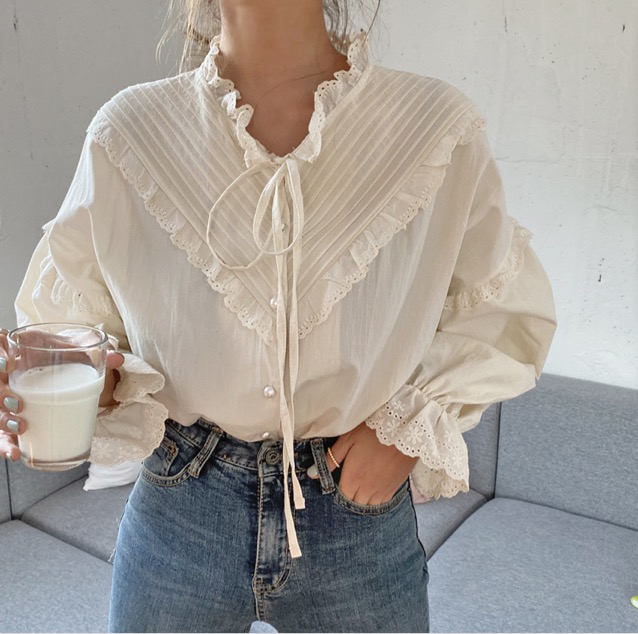 Blouse ample vintage avec nœud et dentelle blouse ample vintage avec noeud et dentelle