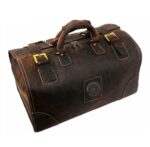 Sac de voyage en cuir synthétique vintage. Bonne qualité et très à la mode