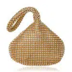 Petit sac à main vintage en forme de boule à strass. Bonne qualité et très original.
