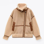 Veste de motard en daim et laine vintage beige pour femme. Bonne qualité et très confortable.