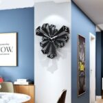 Horloge vintage hexagonale pour salon, bonne qualité et très à la mode accrochée sur un mur dans une maison