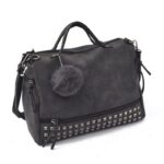 Sac à bandoulière en couleur unie avec pompon pour femme, couleurs noires. Bonne qualité et très à la mode.