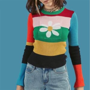 Pull vintage multicolore avec marguerite pour femme. Bonne qualité et très confortable.