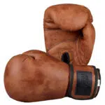 Gants de boxe en simili cuir couleur rétro marron. Bonne qualité et très confortable.