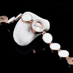 Montre bracelet rond vintage à quartz pour femmes blanc