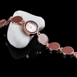 Montre bracelet rond vintage à quartz pour femmes marron