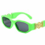 Lunette de soleil de luxe de couleur verte et dorée avec des verres de couleur sombre