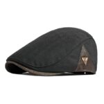 Casquette plate pour homme en style vintage de couleur noir avec un symbole de couleur doré