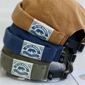 Bonnet docker marin ajustable pour homme et femme présenté en 3 couleurs , beige, bleu et vert